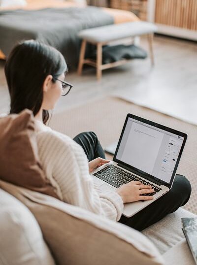 Woman working as a copywriter with her laptop